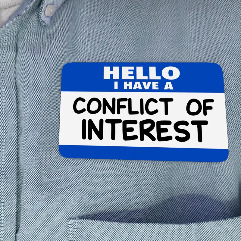 Closeup of a nametag on a shirt, that says