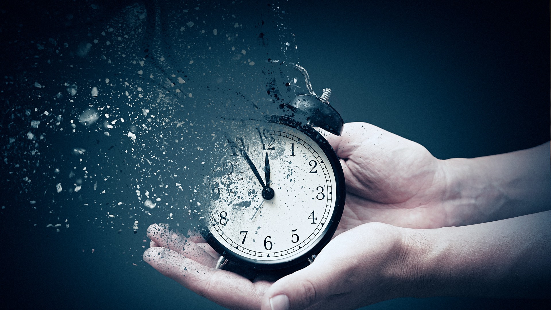 Hand holding a stopwatch