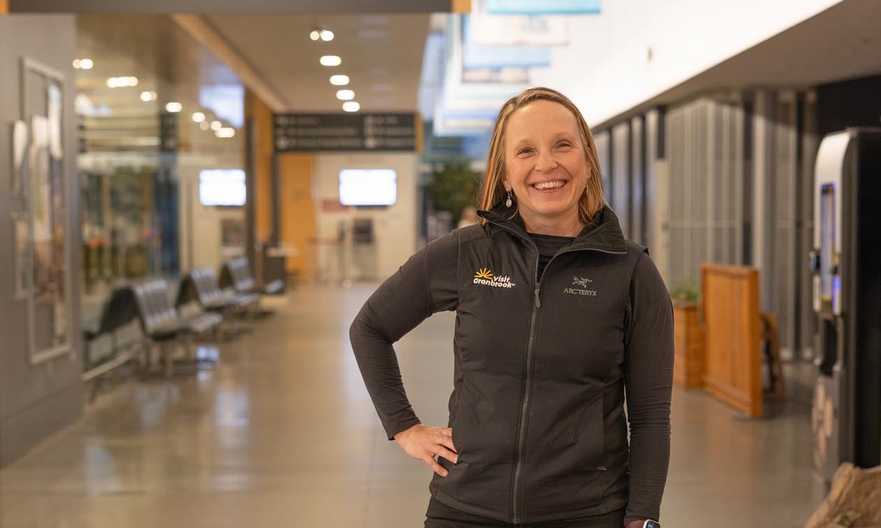 Kristy Jahn Smith standing in a hallway with her hand on her hip