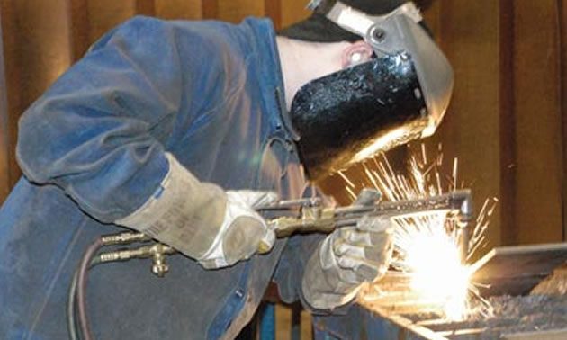 Picture of person welding. 
