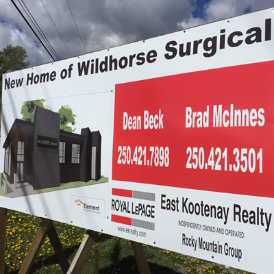 Real estate sign announcing new home of Wildhorse Surgical. 