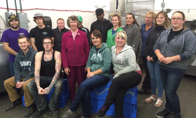 Top Hand Supplies Ltd. (Pets Go Raw) in Cranbrook is Kootenay Business's Manufacturer of the year. Pictured are CEO/general manager Sherin Laurie and staff.